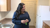 Woman moves into new Habitat For Humanity home